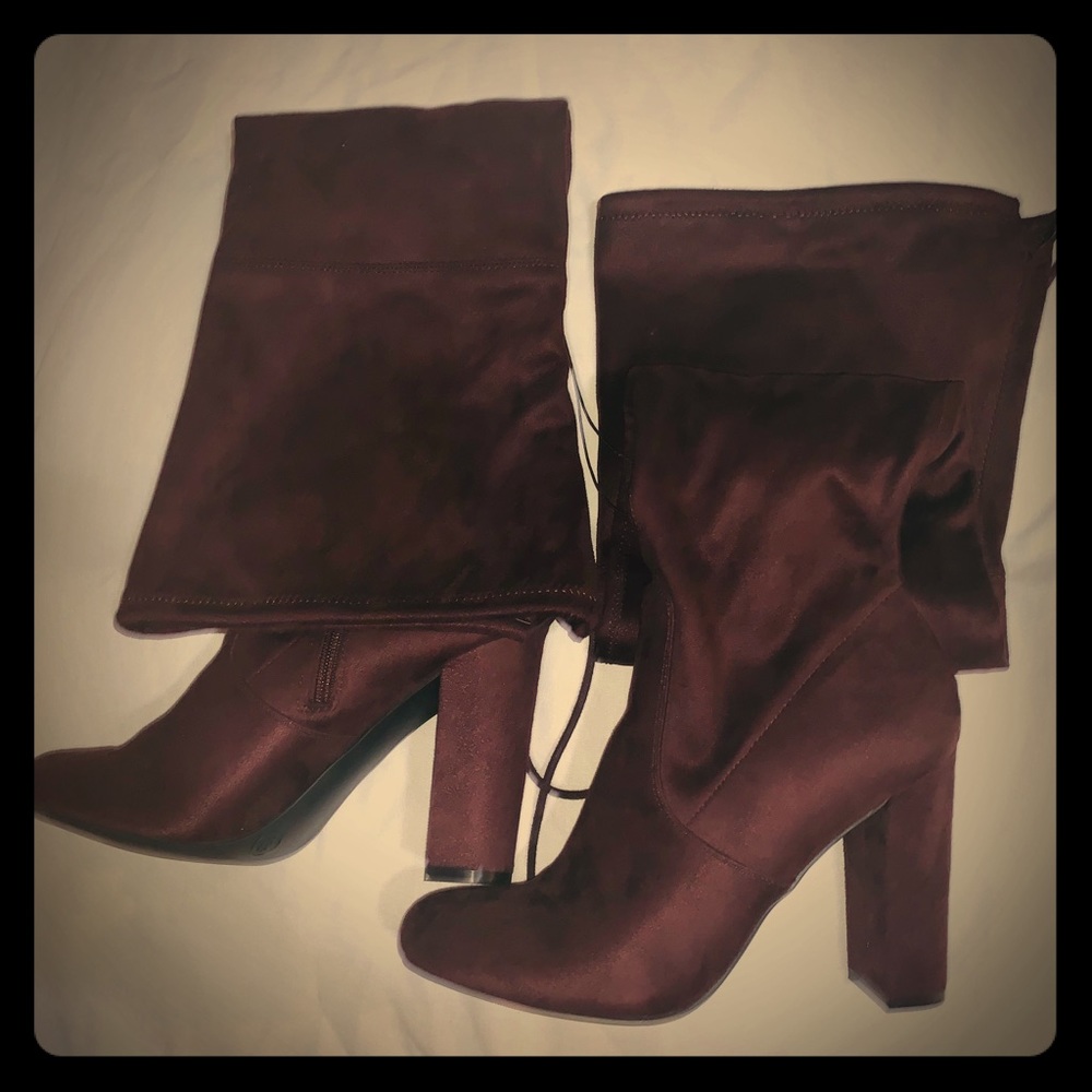 Burgundy thigh-hi boot brand new, never worn.